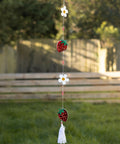 STRING OF DAISY AND STRAWBERRY SUNCATCHERS